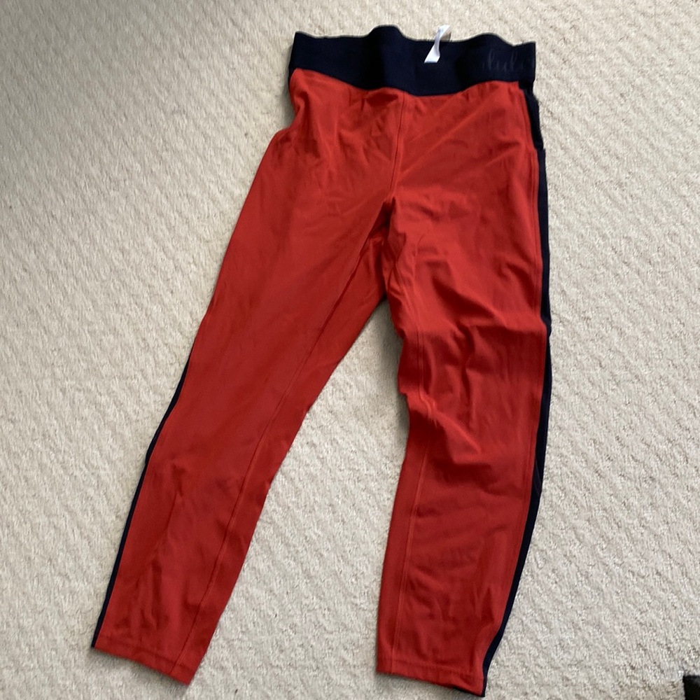 Orange and black elastic waist pant.